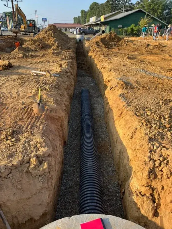 Laying drain pipe