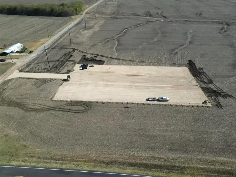 Gravel pad on open ground