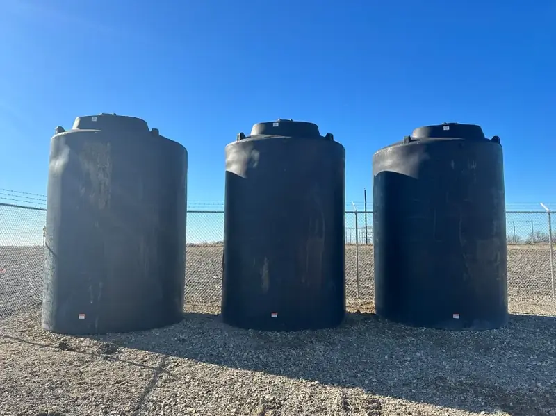Water tanks set on gravel