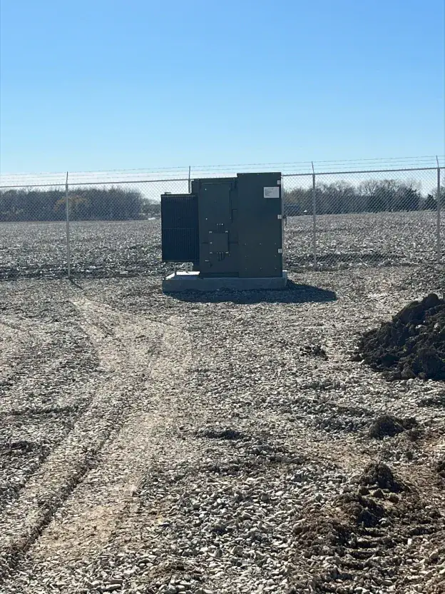 Utility cabinet on a gravel pad