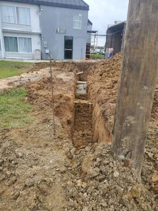 Trenching by a utility pole