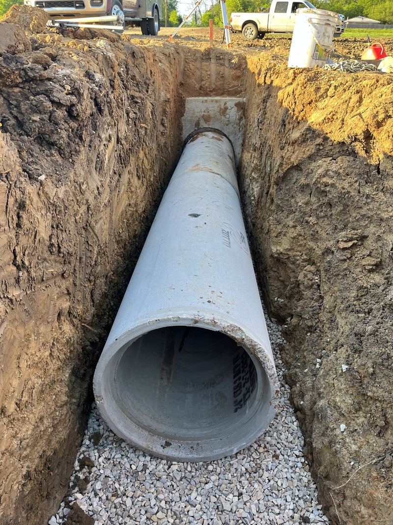 Setting concrete pipe