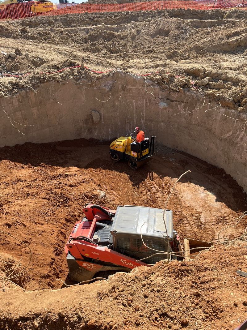 Compacting a deep excavation